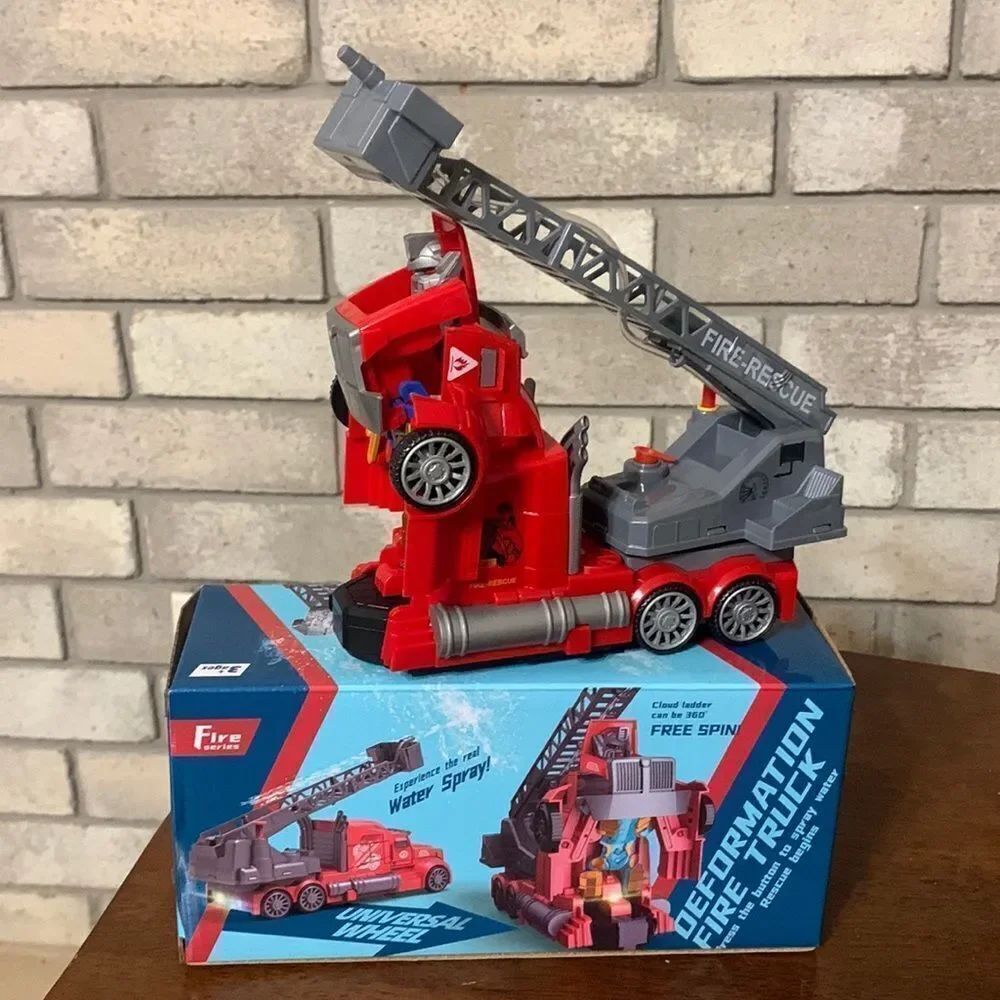 3for$20 NWT transformer fire truck red sounds plus light automatic rotation